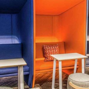 Comfortable and colorful work space cubicles at Tru by Hilton Bowling Green.