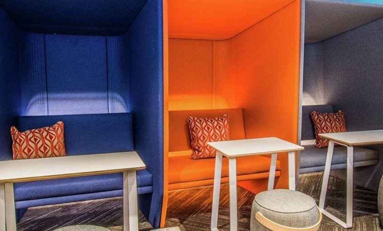 Comfortable and colorful work space cubicles at Tru by Hilton Bowling Green.