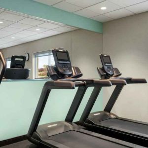 Equipped fitness center at Tru by Hilton Milwaukee Brookfield.