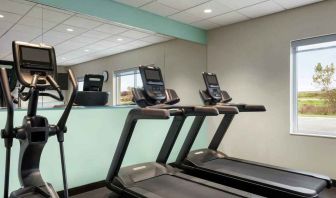 Equipped fitness center at Tru by Hilton Milwaukee Brookfield.