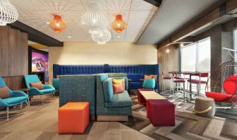 Bright, comfortable coworking space at Tru by Hilton Milwaukee Brookfield.