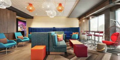 Bright, comfortable coworking space at Tru by Hilton Milwaukee Brookfield.