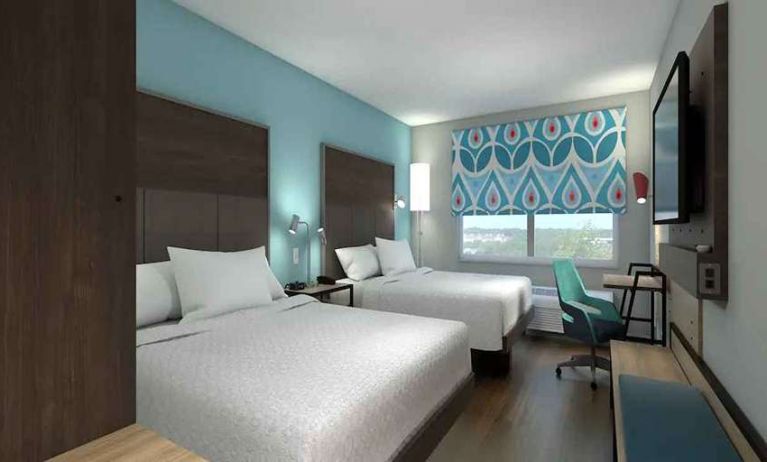 Double king beds with work desk area at Tru by Hilton Edinburg.