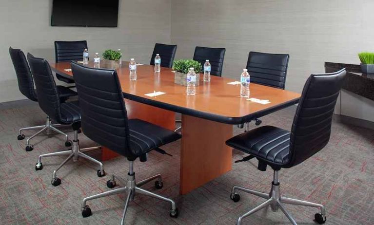 Small, professional meeting room at DoubleTree Suites by Hilton Hotel Dayton - Miamisburg.