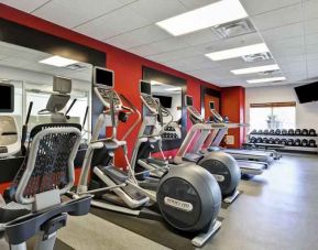 Fitness center with treadmills and exercise bikes at the Hilton Garden Inn Fort Collins.
