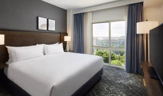 Comfortable king size bed on executive floor at the Hilton Charlotte Airport