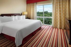 Comfortable king size bed at the Hilton Charlotte Airport