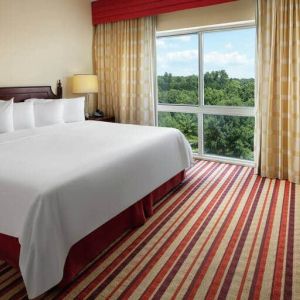 Comfortable king size bed at the Hilton Charlotte Airport