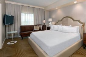 Comfortable king size bed on presidential suite at the Hilton Charlotte Airport