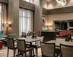 Well-lit, spacious lounge and work area for coworking at Hampton Inn Wichita Northwest.