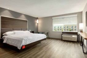 spacious delux king bed with natural light at Tru by Hilton Wichita Northeast.