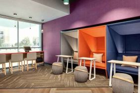 comfortable working space with natural light at Tru by Hilton Wichita Northeast.