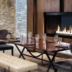 Elegant and comfortable fireside dining area perfect as workspace at the Hilton Denver City Center.