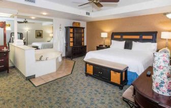 Beautiful suite with king size bed, whirlpool and desk at the Hampton Inn & Suites Amelia Island-Historic Harbor Front.