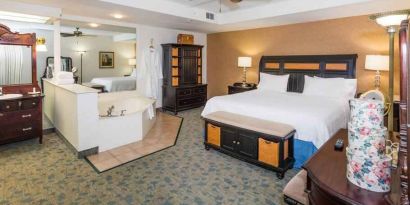 Beautiful suite with king size bed, whirlpool and desk at the Hampton Inn & Suites Amelia Island-Historic Harbor Front.