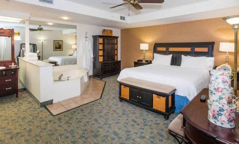 Beautiful suite with king size bed, whirlpool and desk at the Hampton Inn & Suites Amelia Island-Historic Harbor Front.