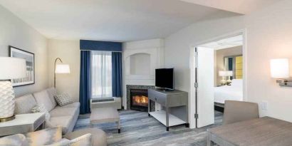 Spacious and comfortable king studio with living room at the Hampton Inn & Suites Amelia Island-Historic Harbor Front.