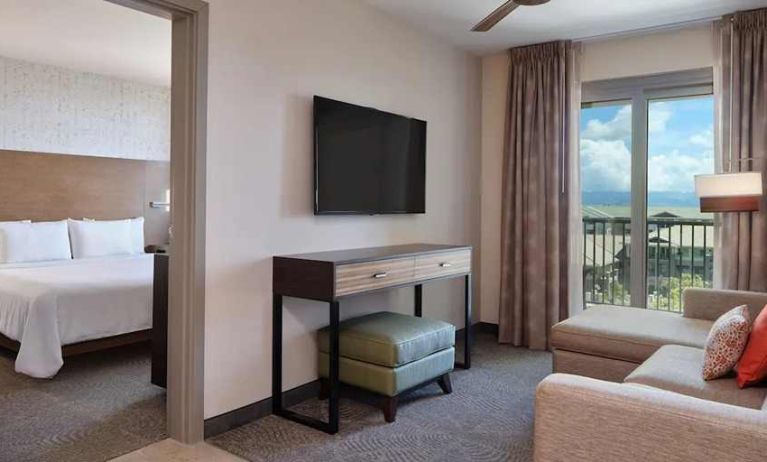 luxurious king bed at Embassy Suites by Hilton Oahu Kapolei.