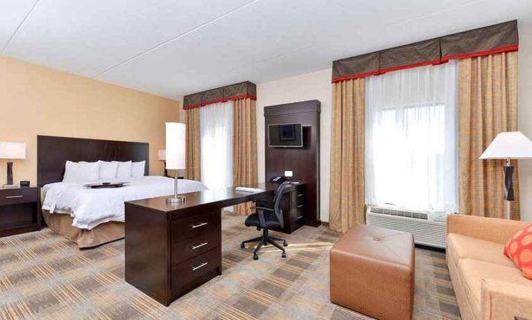 spacious delux king suite with work desk and lounge at Hampton Inn & Suites California University-Pittsburgh.