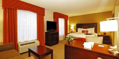 delux king suite with work desk at Hampton Inn & Suites Phoenix/Gilbert, AZ.