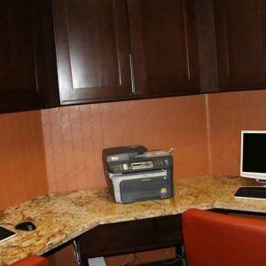 work desk with computers and printers at Hampton Inn & Suites Phoenix/Gilbert, AZ.