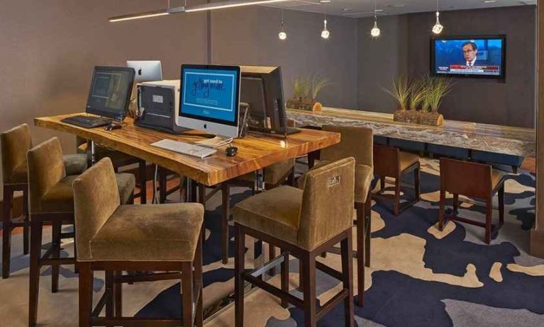 perfect work area fully equipped for coworking or individual work at Hilton Raleigh North Hills.