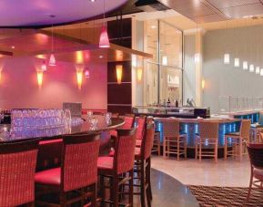 Elegant bar area suitable as workspace at the DoubleTree Suites by Hilton Detroit Downtown - Fort Shelby.