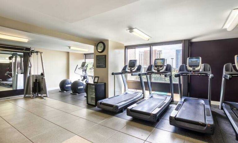 Fitness center with treadmills at the DoubleTree Suites by Hilton Houston by the Galleria.