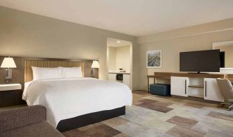 comfortable king suite with work area at Hampton Inn Salt Lake City Cottonwood.