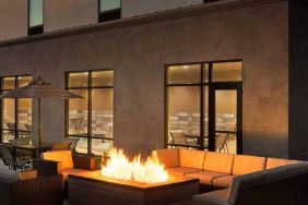 beautiful outdoor patio with comfortable seating and coworking space at Hampton Inn Salt Lake City Cottonwood.