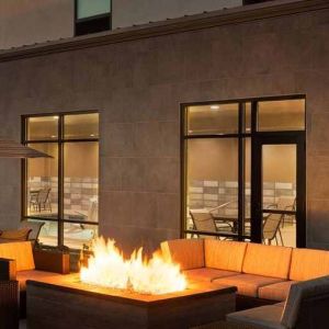 beautiful outdoor patio with comfortable seating and coworking space at Hampton Inn Salt Lake City Cottonwood.