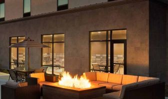 beautiful outdoor patio with comfortable seating and coworking space at Hampton Inn Salt Lake City Cottonwood.