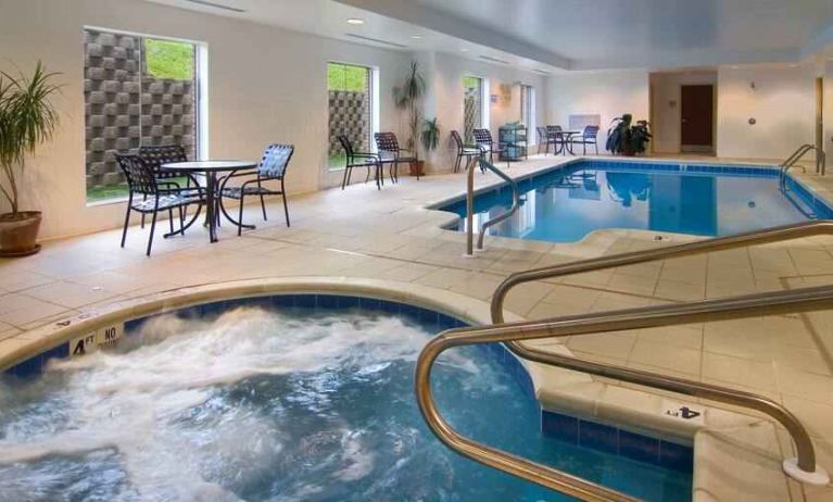 Relaxing indoor pool area with whirlpool at the Hilton Garden Inn Clarksburg.