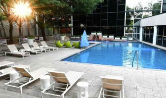 Relaxing outdoor pool area at the Hilton Dallas Lincoln Centre.