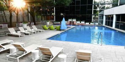 Relaxing outdoor pool area at the Hilton Dallas Lincoln Centre.