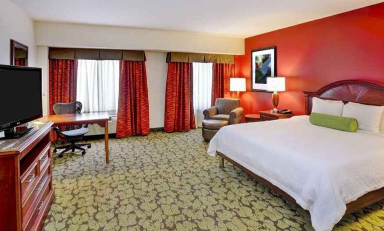 spacious king room equipped with work desk and natural light at Hilton Garden Inn Chicago/Midway Airport.