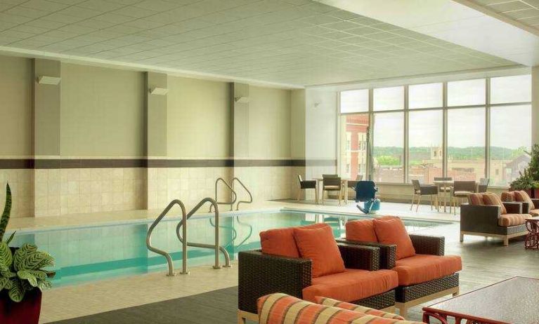 Relaxing indoor pool area at the DoubleTree by Hilton Cedar Rapids Convention Complex.