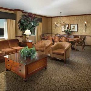 Spacious living room in a hotel suite at the DoubleTree by Hilton Lisle-Naperville.