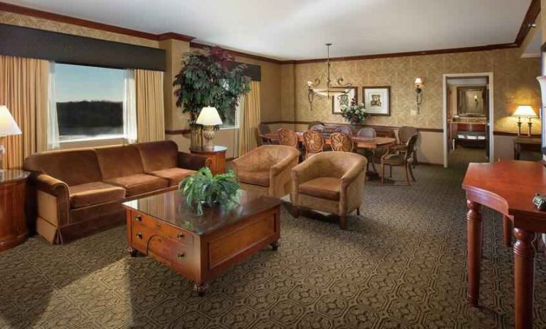 Spacious living room in a hotel suite at the DoubleTree by Hilton Lisle-Naperville.