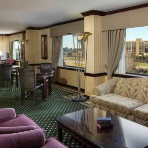 Comfortable seating lounge area with sofas and chairs at the DoubleTree by Hilton Lisle-Naperville.