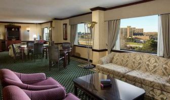 Comfortable seating lounge area with sofas and chairs at the DoubleTree by Hilton Lisle-Naperville.