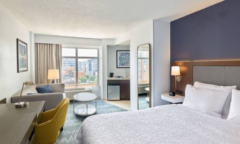 Bright and spacious studio with king size bed, sofa and desk at the Hampton Inn Washington-Downtown-Convention Center, DC.