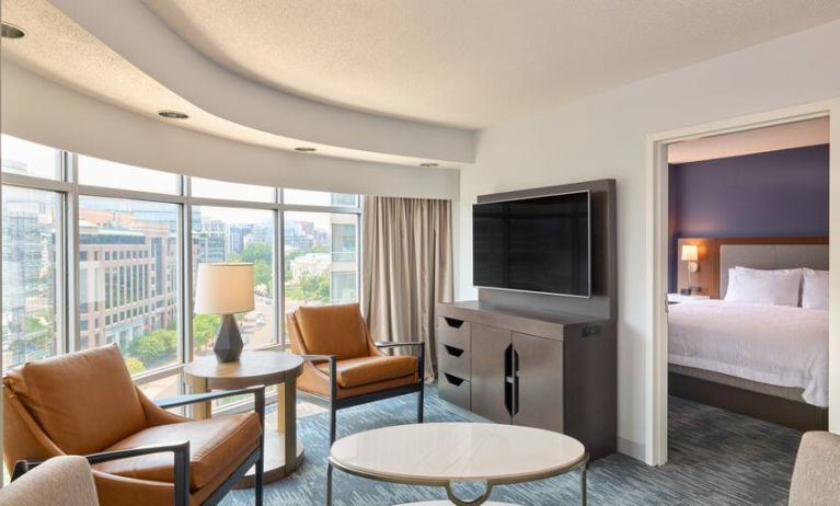 Bright living room with working station at the Hampton Inn Washington-Downtown-Convention Center, DC.