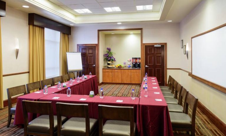 Meeting room with square conference table at the Hampton Inn Washington-Downtown-Convention Center, DC.