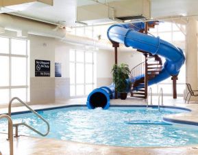 Indoor pool with spiral slide at the Hampton Inn & Suites Lethbridge, AB,CN