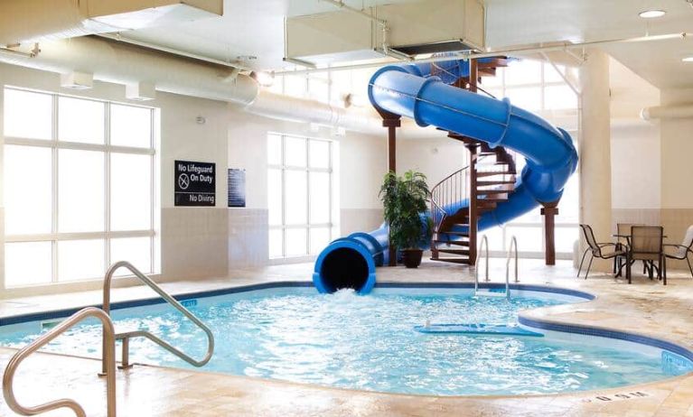 Indoor pool with spiral slide at the Hampton Inn & Suites Lethbridge, AB,CN