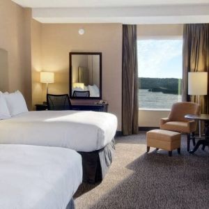 Spacious room with 2 queen beds, desk,chair and view of the harbour at the Hilton Saint John