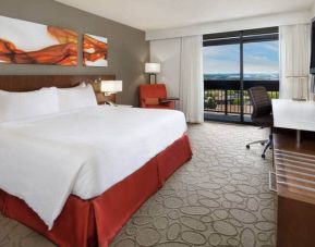 Bright and spacious day use room with view, work desk, sofa and private bathroom at Hilton Mississauga Meadowvale.