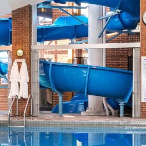 Indoor pool with spiral slide at the Hilton Mississauga Meadowvale