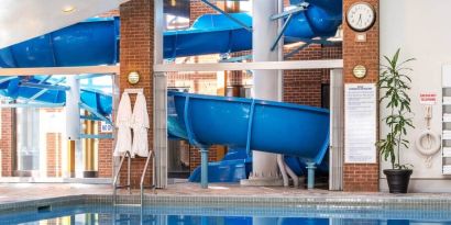 Indoor pool with spiral slide at the Hilton Mississauga Meadowvale